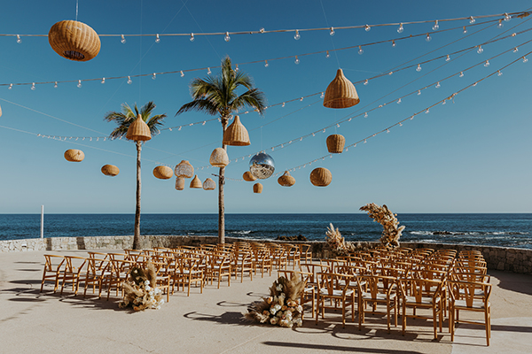 Fiesta Americana wedding setup in Cabo San Lucas — couple at sunset on Fairway Terrace